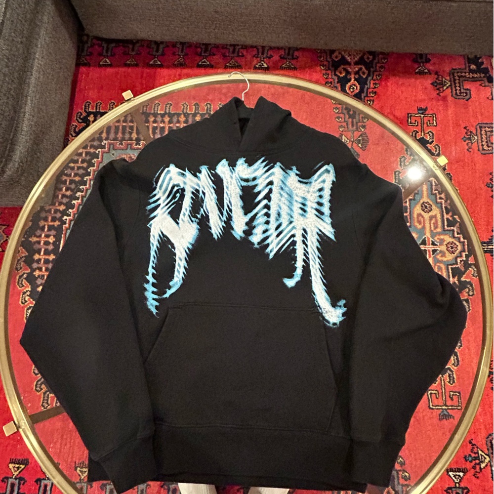 Revenge Clothing Black Hoodie with Light Blue Graphic